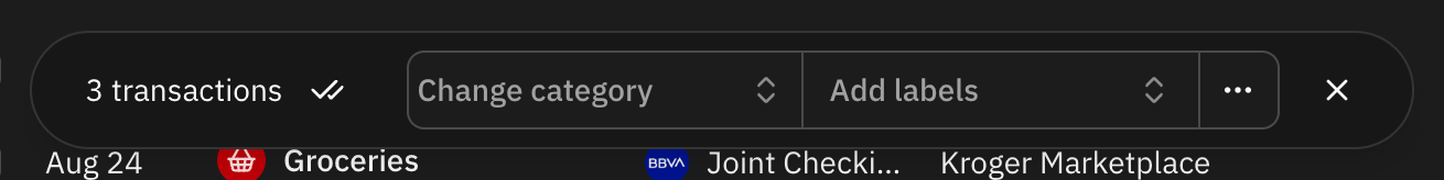 The bulk actions bar, showing the number of selected transactions next to the category and label pickers