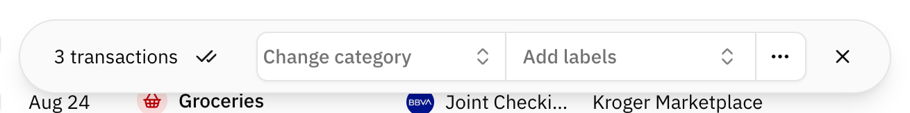 The bulk actions bar, showing the number of selected transactions next to the category and label pickers