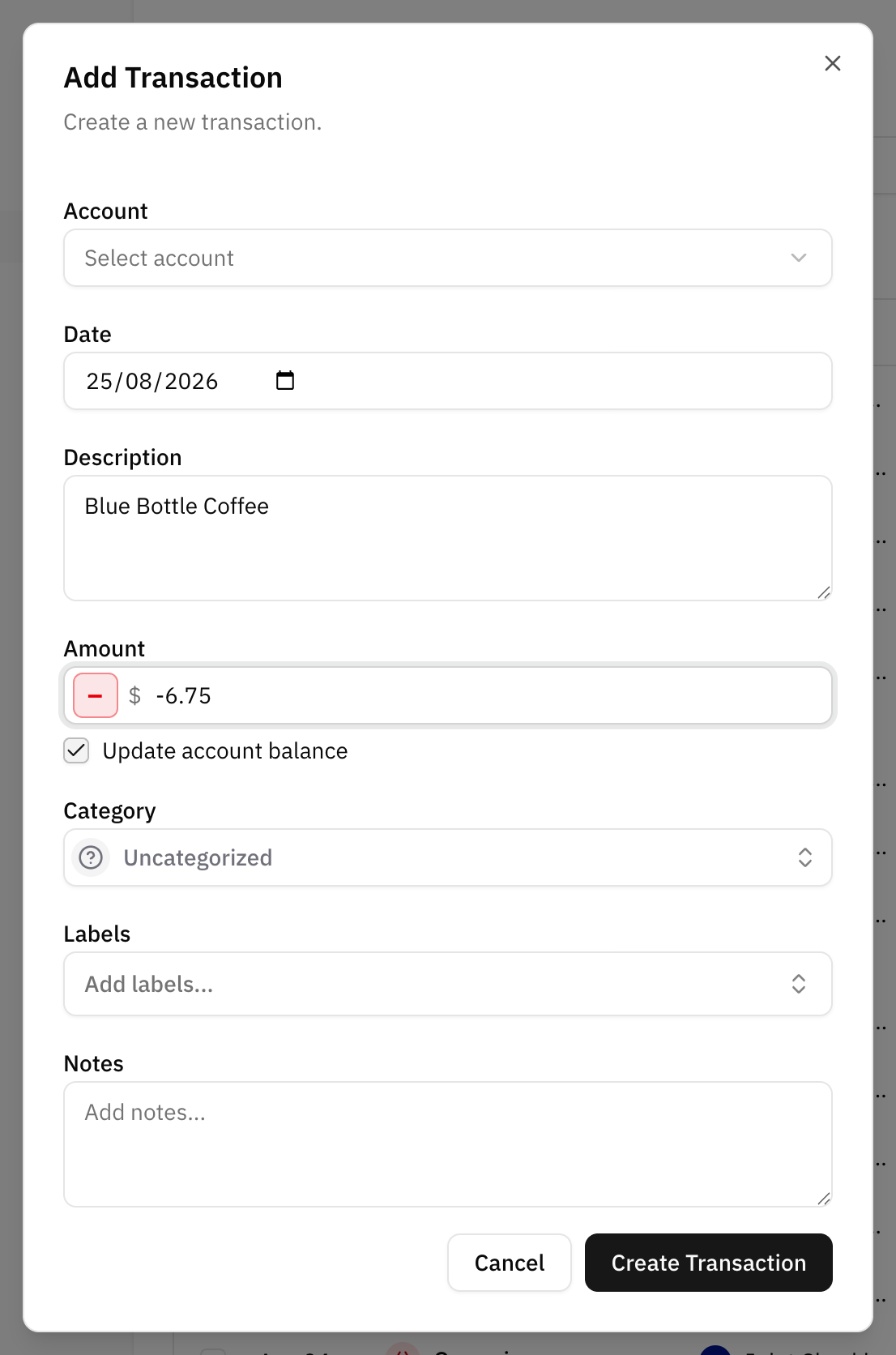 The create transaction dialog, with the account, date, description and amount fields filled in and the category and labels pickers below them