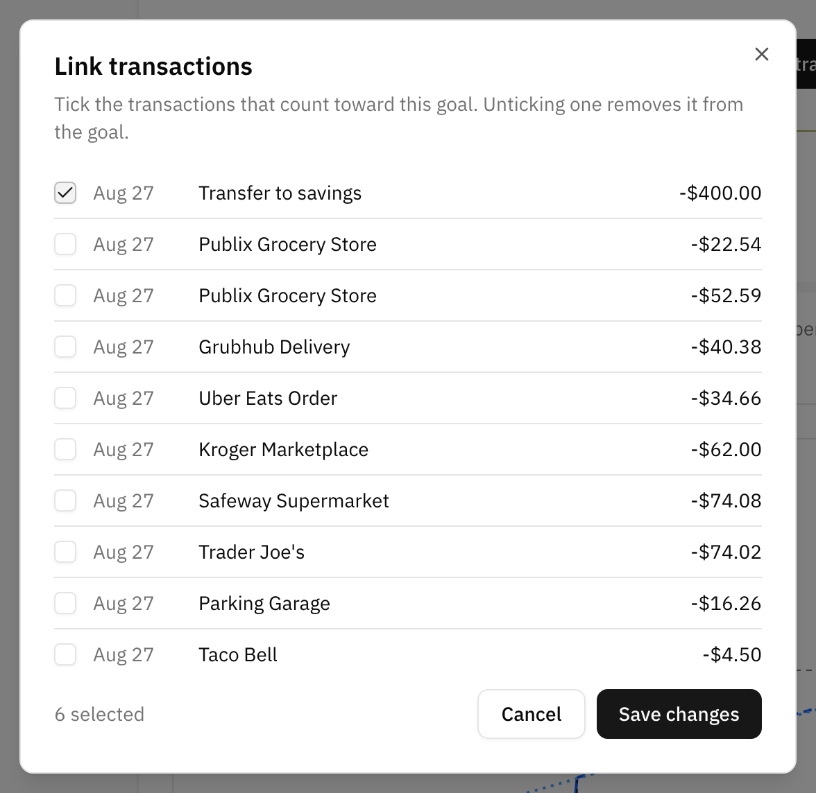 The link transactions dialog listing recent transactions with tick boxes, some of them already linked to the goal