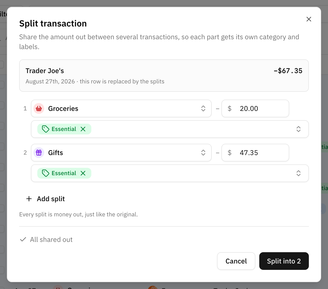 The split dialog with a supermarket transaction divided into two parts, each with its own category and amount